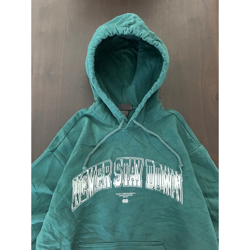 H&M Mens Loose Fit Never Stay Down Graphic Hoodie Green Size M Streetwear